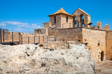 Small medieval stone castle on the rock, Spain