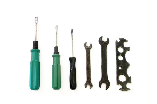 screwdrivers and wrenches on a white background