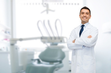 smiling male middle aged dentist