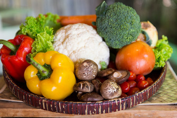 basket of fresh ripe vegetables at kitchen