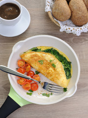 Omelet with tomatoes and herbs