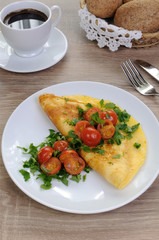 Omelet with tomatoes and herbs