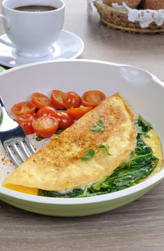 Omelet with tomatoes and herbs