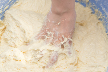 Making dough by female hands