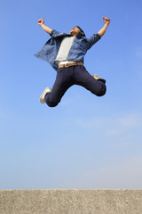 Happy man run and jump