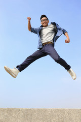Happy man run and jump
