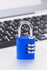 Padlock on keyboard concept computer security
