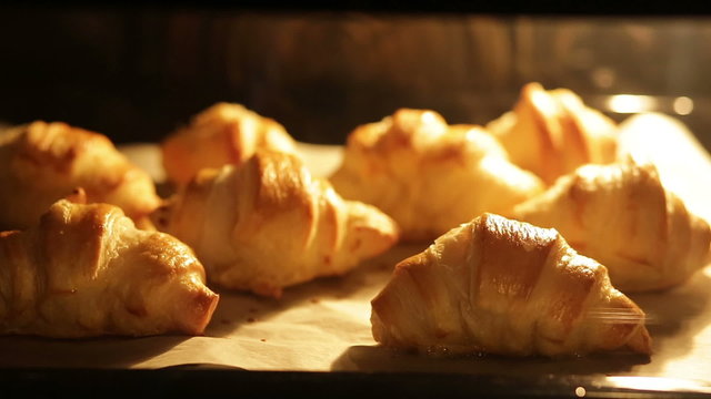 Time-lapse video of croissants baking in oven