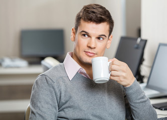 Employee Having Coffee In Call Center