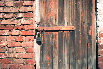 old wooden door with a padlock