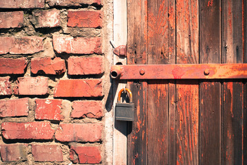 old wooden door with a padlock