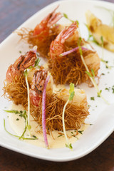 fried shrimp wrapped in pastry threads