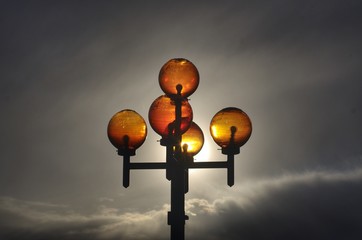 Yellow glass lanterns. city lights. counterlight photo