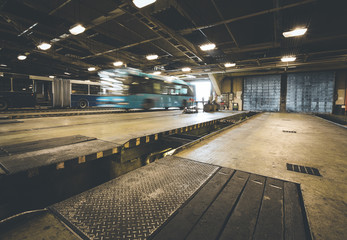  dirty, oily bus garage inspection pit