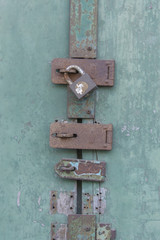 Old wooden door with padlock