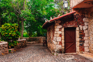 Road in park. Ancient village Altos de Chavon - Colonial town
