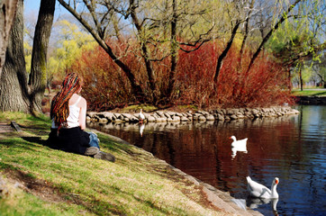 Girl at duck pond