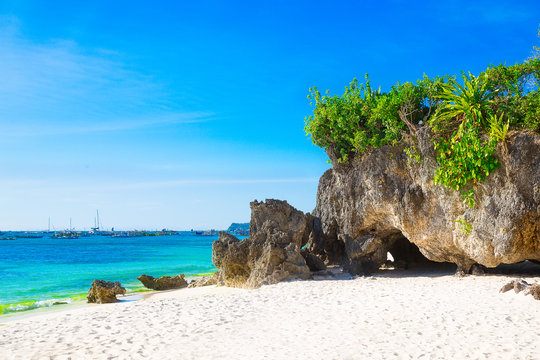 Beautiful landscape of tropical beach, rocks with vegetation