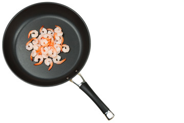 A pan with raw peeled shrimps
