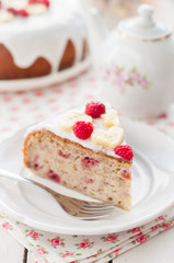 Banana Cake with Sugar Glaze Topped with Raspberries and Banana