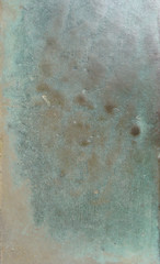 grunge bronze surface in black blue green