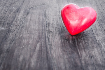 Fototapeta premium red heart on wooden background