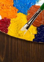 oil paint and brush on wood