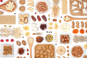 nuts and dried fruits on white background