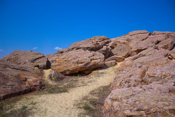 Huge stones against sky background