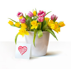 Red and yellow tulips bouquet with a heart 