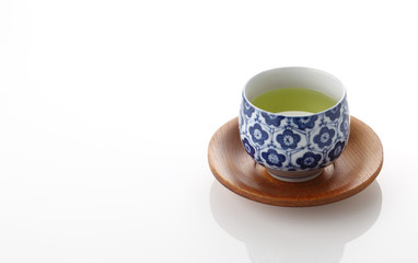 Japanese green tea in porcelain cup