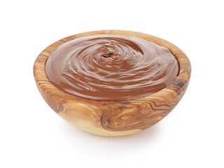 chocolate hazelnut cream in wood bowl, isolated