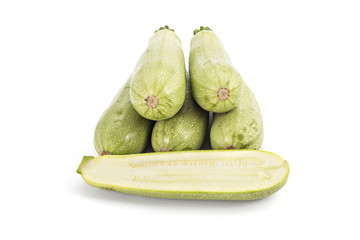 Young fresh courgettes (zucchini) isolated on white