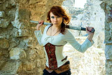 Ancient female knight in metal armor