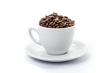White coffee cup with saucer, and coffee-beans isolated on white