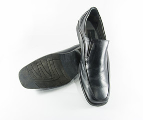 Black man leather shoe  on white background.