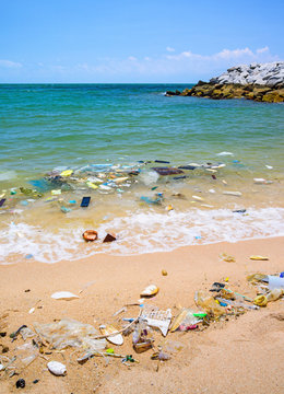 Pollution on the beach of tropical sea.