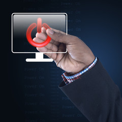 Man showing the power button