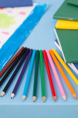 Multicolored pencils on the table