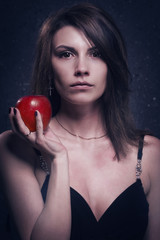 Lonely mad woman with red apple
