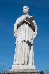 Fototapeta premium Reverend James Canon Roche statue Church Wexford