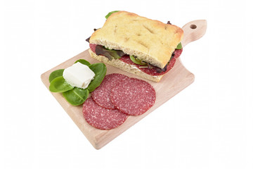 focaccia salami and gorgonzola on chopping board