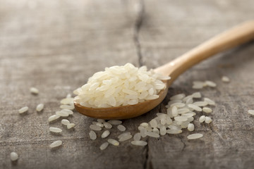 Rice in wooden spoon