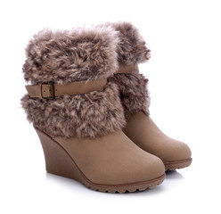 
Women's winter boots with fur on a white background