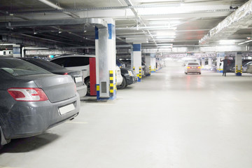 Underground parking with cars.