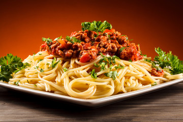 Pasta with meat, tomato sauce and vegetables 