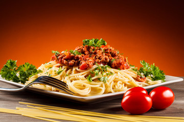 Pasta with meat, tomato sauce and vegetables 