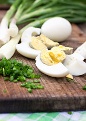 eggs, green onions, herbs on the table