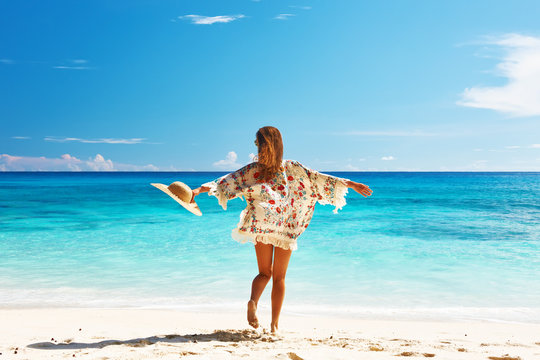 Woman bikini sarong beach happy hi-res stock photography and images - Alamy