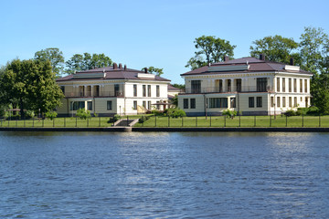 Fototapeta na wymiar St. Petersburg. The cottage settlement on the bank of the river